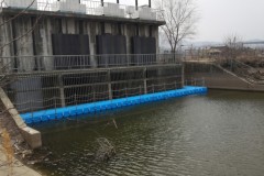 Floating bridge for floodgate management